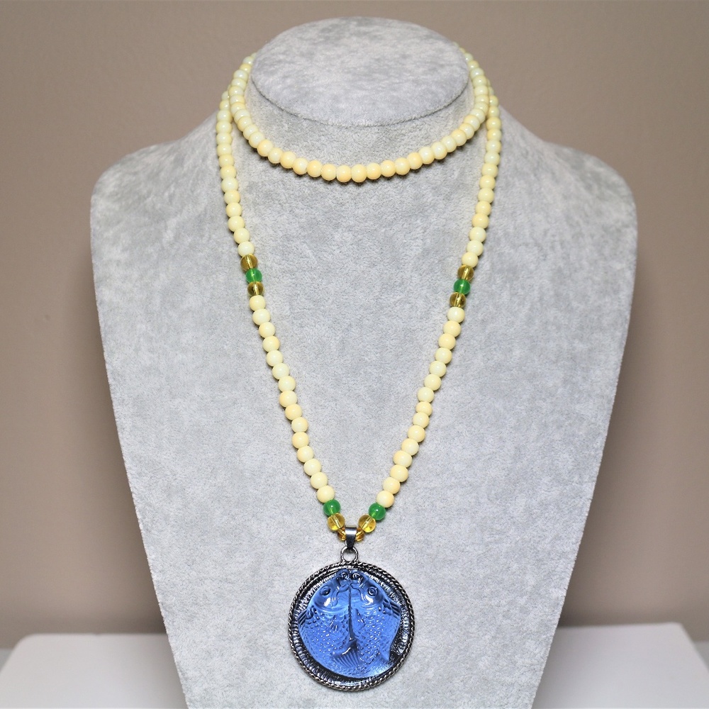The "Two Golden Fish" Pearl Necklace.